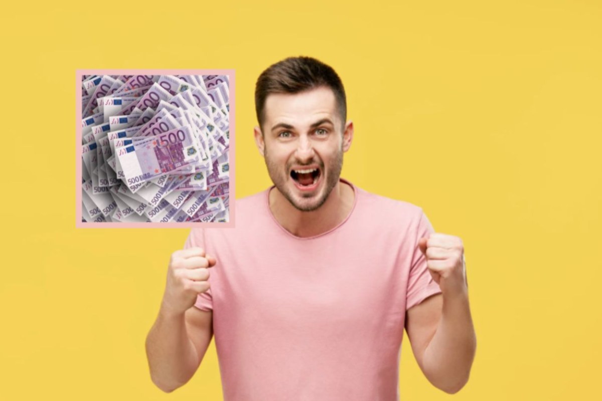 uomo che esulta e banconote da 500 euro