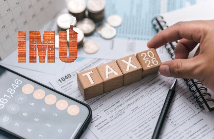 la scritta IMU, tasse 2026 ed una calcolatrice
